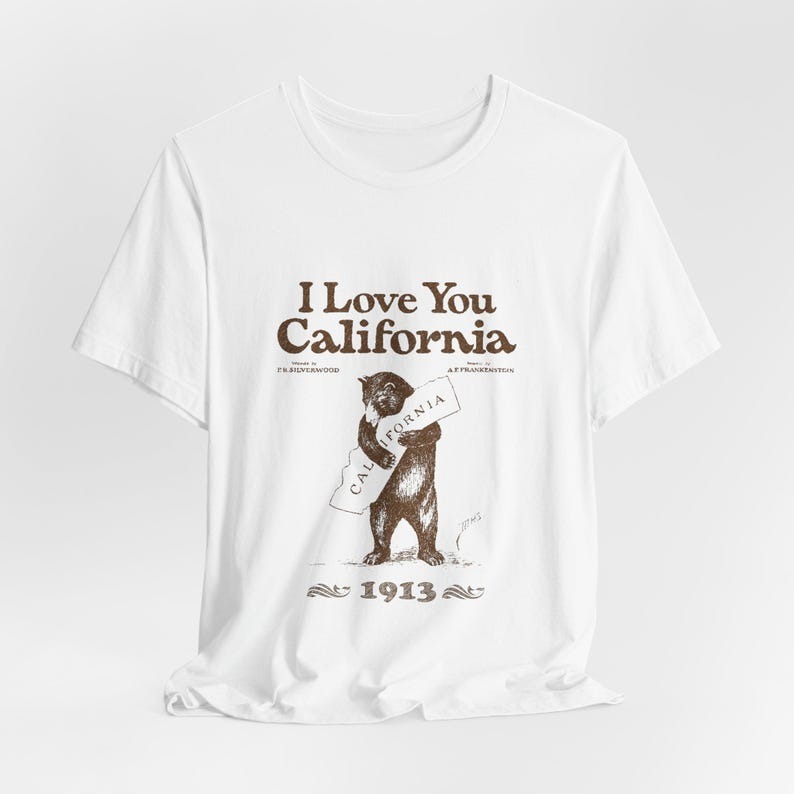 White t-shirt with a California Grizzly bear hugging the state